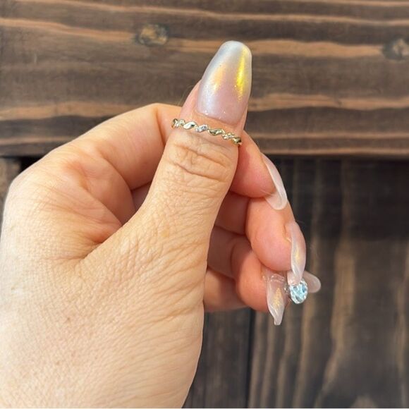 Elegant 14K Gold Plated Twisted Zirconia Ring - Picture 3 of 11